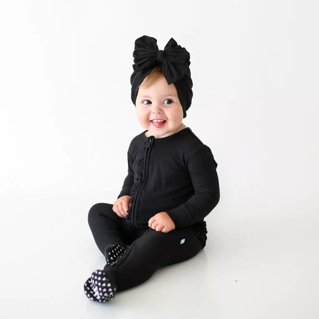 Posh Peanut Black Ribbed Footie Ruffled Zippered One Piece